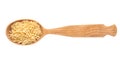 Wooden spoon with raw alphabet pasta on white background Royalty Free Stock Photo