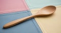 Wooden spoon resting on a patchwork Royalty Free Stock Photo