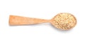 Wooden spoon with sesame seeds on white background. Different spices Royalty Free Stock Photo