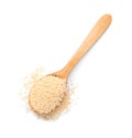 Wooden spoon with sesame seeds on white background, top view Royalty Free Stock Photo