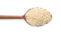 Wooden spoon with sesame seeds on white background, top view Royalty Free Stock Photo