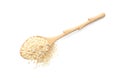 Wooden spoon with sesame seeds on white background, top view Royalty Free Stock Photo