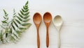 Wooden spoon and spatula on rustic table in kitchen generated by AI Royalty Free Stock Photo