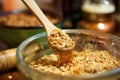 wooden spoon stirring apple crisp mixture