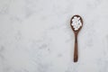 Wooden spoon with sweetener tablets or pressed powder of natural sugar substitute. Top view, copy space. Design element. Sweetener Royalty Free Stock Photo