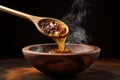 wooden spoon swirling in steaming soup