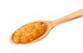 Wooden spoon with tasty apricot jam isolated on white Royalty Free Stock Photo