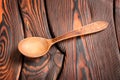 Wooden spoon on the wooden background Royalty Free Stock Photo