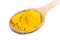 Wooden spoon with yellow curry powder Royalty Free Stock Photo