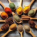 Pattern display an array of colorful spices on a rustic wooden Royalty Free Stock Photo