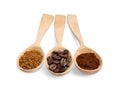 Wooden spoons of beans, instant and ground coffee on white background Royalty Free Stock Photo