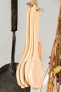 Wooden spoons hanging with robe Royalty Free Stock Photo