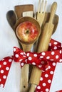 Wooden spoons, red tape lunar white wood background. Royalty Free Stock Photo