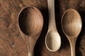 Wooden spoons set on the stone background Royalty Free Stock Photo