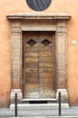 Wooden squared style front door Royalty Free Stock Photo