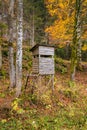 Wooden stable hunting blind hunting hide in a forest