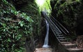 Wooden Stair In The Mountains Of Italy With A Waterfall