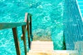 wooden stair into the ocean in Maldives Royalty Free Stock Photo