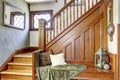 Wooden staircase with bench in old house Royalty Free Stock Photo