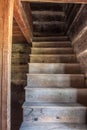 Wooden Staircase in Log Building