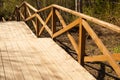 Wooden staircase in the park. stairs made from the wood in the forest Royalty Free Stock Photo