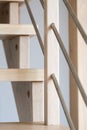 Wooden staircase with stainless steel elements