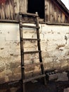 The wooden staircase to the loft of the barn