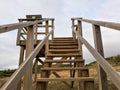 Wooden staircase in a viewpoint of Andelos overlooking the sky. Andelos was a Roman city now in ruins. Located in the town of Royalty Free Stock Photo
