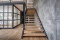 Wooden stairs in apartment house with modern interior design Royalty Free Stock Photo