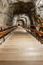 Wooden stairs going down into salt mine Royalty Free Stock Photo