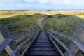 Wooden stairs going down into the sea in Breskens, Netherlands Royalty Free Stock Photo