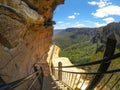 Wooden stairs at hiking trail along the cliff with beautiful mountain view of Wentworth Falls, New south wales, Australia. Royalty Free Stock Photo