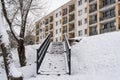 Stairs leads to top of hill covered in snow Royalty Free Stock Photo