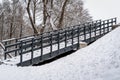 Wooden stairs leads to top of hill covered in snow Royalty Free Stock Photo