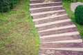 Wooden stairs at the local garden leading down the path Royalty Free Stock Photo