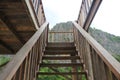 Wooden stairs with mountain and sky background Royalty Free Stock Photo