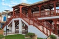 Wooden stairs in the porticoed Constitucion square in the beautiful villa of Puerto Lapice, Spain