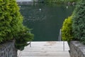 Wooden springboard for descent to the mountain pool