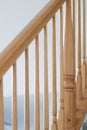 Wooden stairs. Stair handrail closeup. Royalty Free Stock Photo