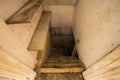 Wooden stairs to the scary dark basement