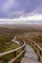 Wooden stairs on a trail through beautiful countryside up a mountain. Cuilcagh Boardwalk Trail in Fermanagh Royalty Free Stock Photo