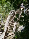 Wooden stairs on the trail to Inelet and Scarisoara hamlets, Romania