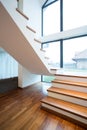 Wooden stairway in detached house Royalty Free Stock Photo