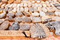 Wooden stamps printing blocks hand carved by artisans on the street market in Jaisalmer, India.