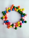 Wooden star made with colorful beads on a white background