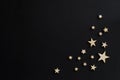 Wooden stars on a black background. Chalk board. Postcard. Dad`s day concept. Men`s Day. Night. Astronomy