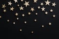 Wooden stars on a black background. Chalk board. Postcard. Dad`s day concept. Men`s Day. Night. Astronomy