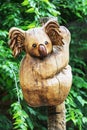 Wooden statue of cute koala, artistic object