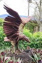 A wooden statue of eagle