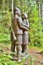 Wooden statue in a forest open-air museum in Vydrovo.